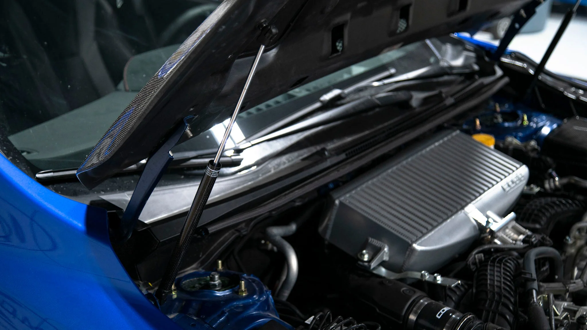 OLM Carbon Fiber Wrapped Hood Struts - 2022+ WRX - Image 7